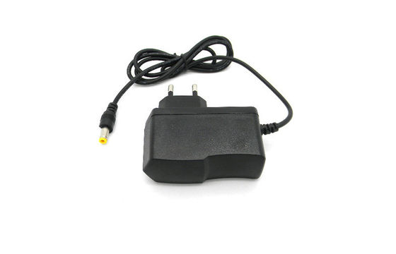 CA all'adattatore 9V 1A sopra tensione per il router, 100-240Vac di potere del supporto della parete di CC