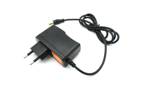CA all'adattatore 9V 1A sopra tensione per il router, 100-240Vac di potere del supporto della parete di CC